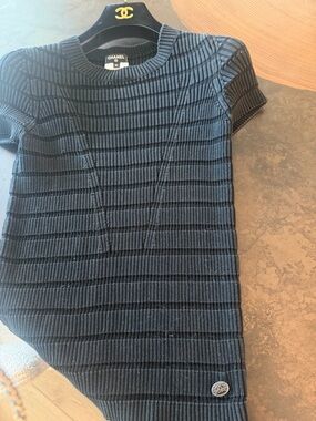 Authentic CHANEL Black Ribbed Short Sleeve Knit Top with Chain Detail